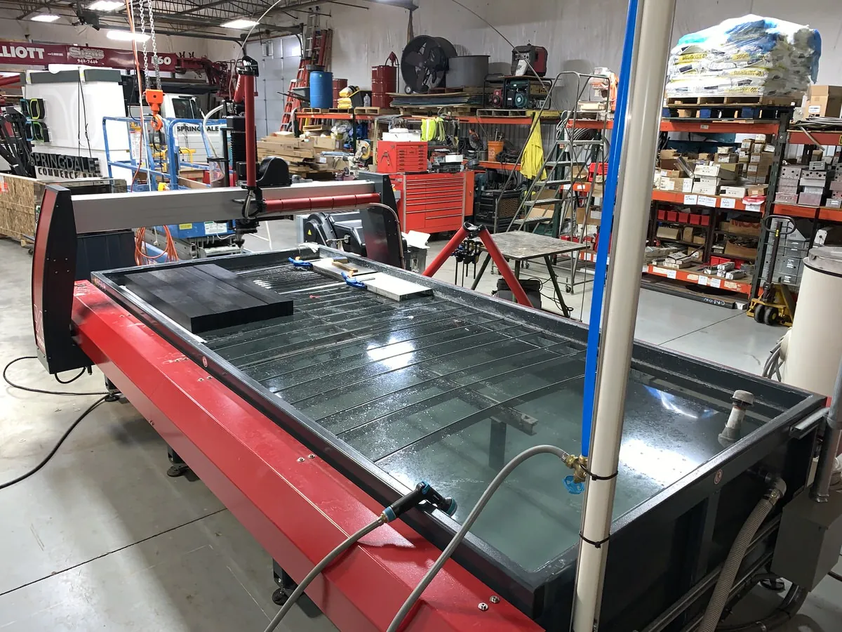 OMAX MAXIEM 1530 waterjet cutting at Tri-State Signs 4