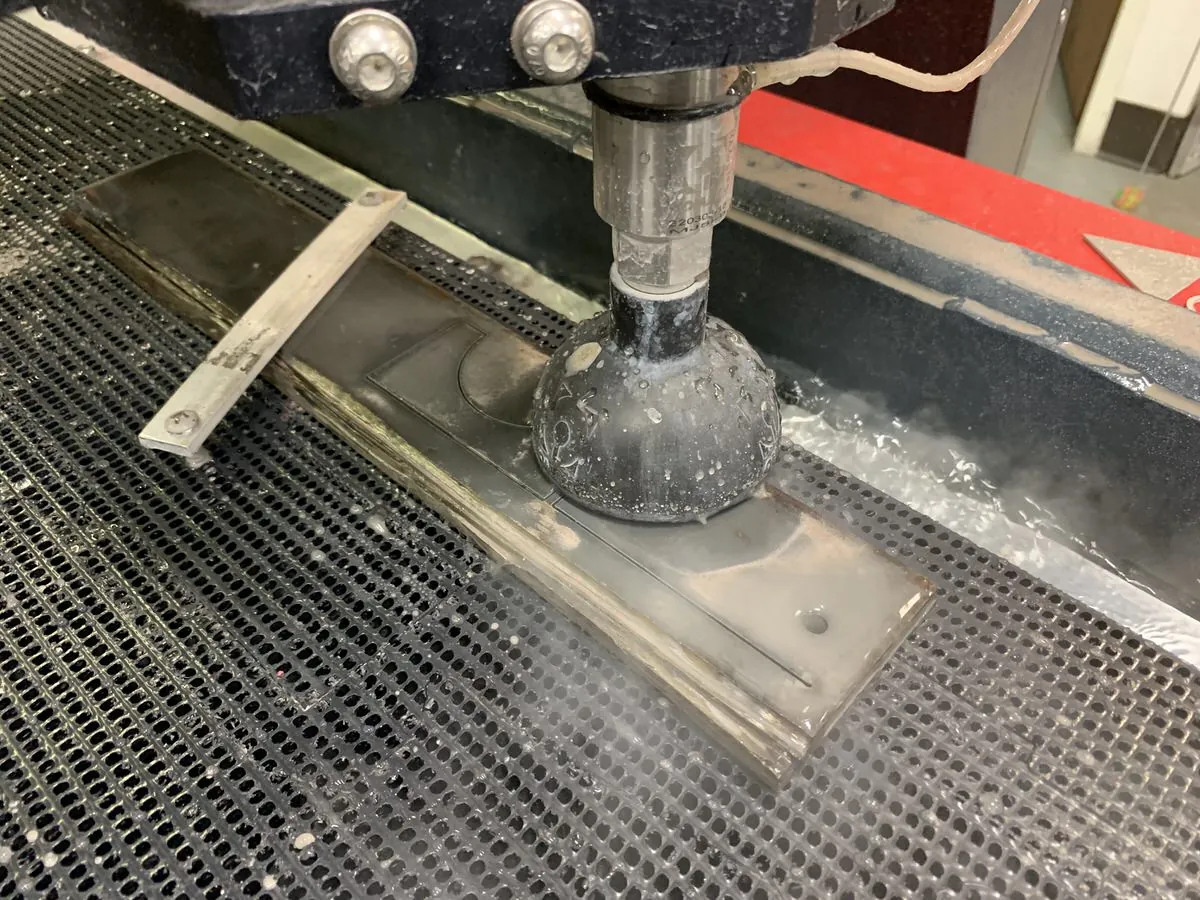 OMAX MAXIEM 1530 waterjet cutting at Tri-State Signs 5
